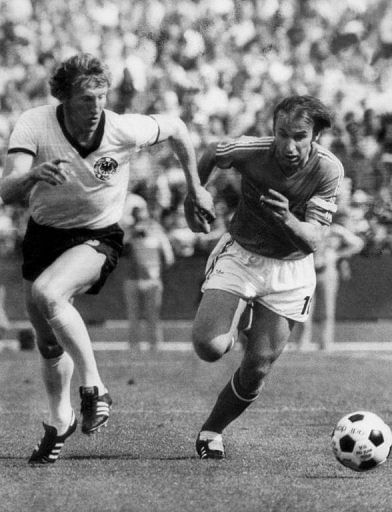 Yugoslavia's Dragan Dzajic (R) chases West Germany's Hans-Georg Schwarzenberg during a 1974 World Cup match